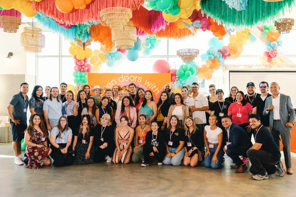 Diverse group of event professionals together at a community gathering